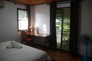 Postel nebo postele na pokoji v ubytování Big Elk Steak House - HomeStay