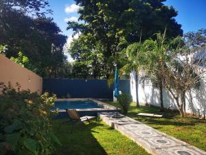 Vonkajšia záhrada v ubytovaní Residencia Maya con Hermosa Alberca y Jardines