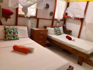 Letto o letti in una camera di Le Petit Paradis