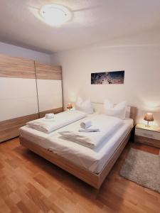 En eller flere senge i et værelse på Winterberg Appartement 21117