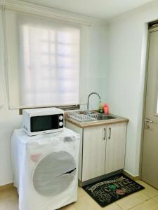 Kuchyň nebo kuchyňský kout v ubytování Casa Pucalan Pichilemu