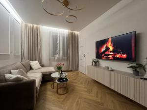 Μια τηλεόραση ή/και κέντρο ψυχαγωγίας στο COCO CITY CENTER Apartment