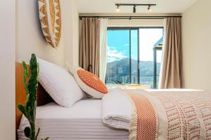Ein Bett oder Betten in einem Zimmer der Unterkunft Bohemi Villa&Bungalov