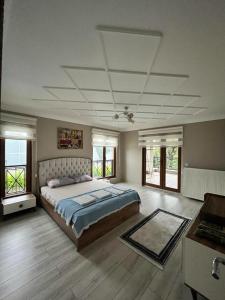 En eller flere senge i et værelse på Bursa Iznik (Nicea) Doğa İçinde Eşsiz Çiftlik Evi