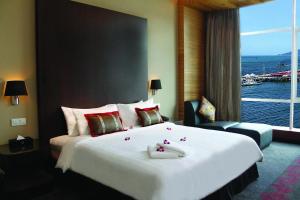 Postel nebo postele na pokoji v ubytování Grandis Hotels and Resorts
