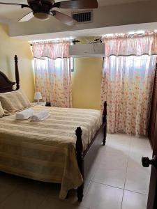 Postel nebo postele na pokoji v ubytování Apartamento amueblado en Villa Olga