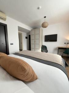 Postel nebo postele na pokoji v ubytování Hotel San Miguel Menorca
