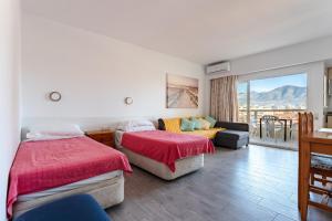 Posteľ alebo postele v izbe v ubytovaní Pyr studio apartment + 15 fotografií