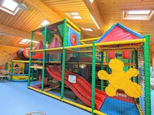 a room with a play area with a playground at 2 Bed in Gower 81463 in Knelston