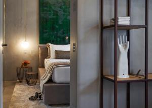 Letto o letti in una camera di Fornace Suite