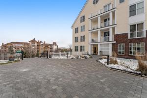 an empty parking lot in front of a building at Long Trail House Condos in Stratton