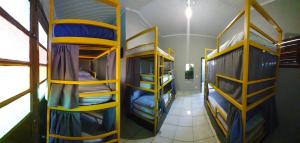 Palanda nebo palandy na pokoji v ubytování Hostel Rota 027 Itacaré