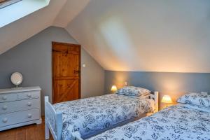 מיטה או מיטות בחדר ב-Finest Retreats - Longhouse at St Keverne