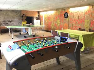 a table with a chessboard on it in a room at La maison de lannion in Lannion