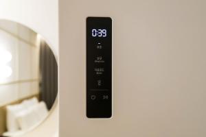 Postel nebo postele na pokoji v ubytování Aank Hotel Daejeon Yuseong 1st