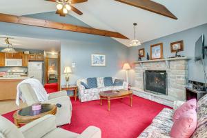 a living room with a couch and a fireplace at 6 Mi to Jack Frost Ski Resort Family Home with Deck in Blakeslee