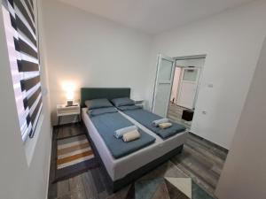 Apartman Arsić Zajecar房間的床