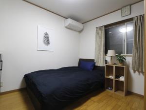 Voodi või voodid majutusasutuse NEW_OPEN新宿エリア・家族やグループ最適・希少独立TOWNHOUSE　 toas