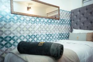 Кровать или кровати в номере Apto a 2 minutos de Parque la Valvanera