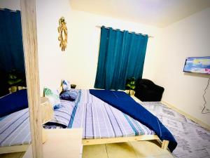 Ένα ή περισσότερα κρεβάτια σε δωμάτιο στο Cozy Private Room in shabiya 12