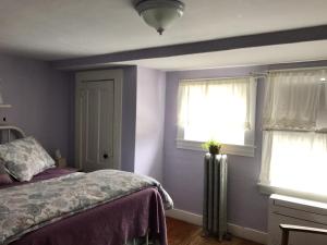 Voodi või voodid majutusasutuse The Monadnock Inn toas