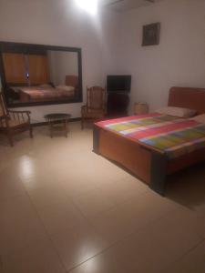 En eller flere senge i et værelse på Royal Mount Hotel