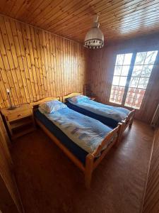 Postel nebo postele na pokoji v ubytování Les Rhodos