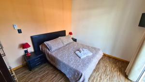 Voodi või voodid majutusasutuse Complejo Cabañas Piriápolis toas
