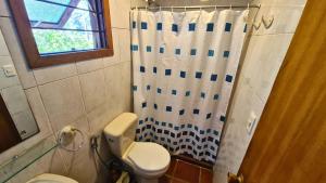 Vannituba majutusasutuses Complejo Cabañas Piriápolis