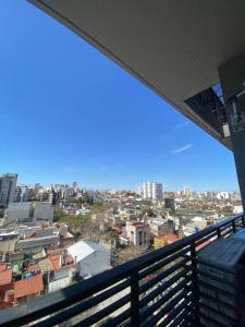 a view of a city from a balcony at Cómodo y práctico departamento in Buenos Aires