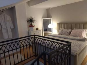 Postel nebo postele na pokoji v ubytování Apartman Element