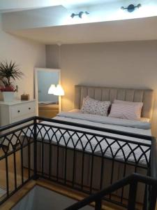 Postel nebo postele na pokoji v ubytování Apartman Element