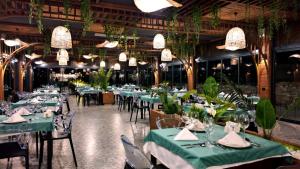 Ein Restaurant oder anderes Speiselokal in der Unterkunft Siu Collection - Ultra All Inclusive 