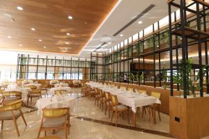 Ein Restaurant oder anderes Speiselokal in der Unterkunft Siu Collection - Ultra All Inclusive 