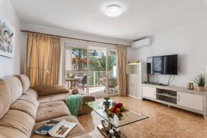 TV a/nebo společenská místnost v ubytování Apartment Penyon - PlusHolidays