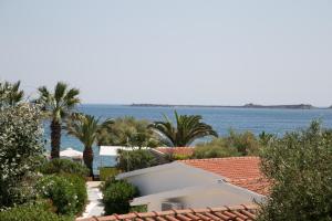 a view of the ocean from the roof of a house at Kefalonia Beach Hotel & Bungalows in Lixouri