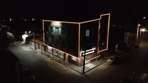 a building with lights on it at night at Pousada Diamante in Ubajara