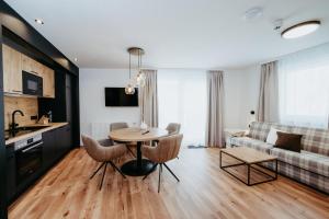 TV a/nebo společenská místnost v ubytování Hotel Brückenwirt Superior