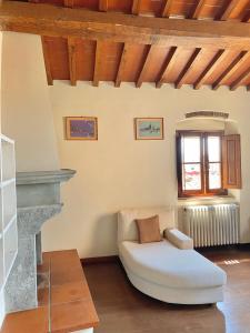 a living room with a couch and a window at Berenice Housing in Prato