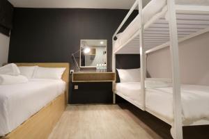 Postel nebo postele na pokoji v ubytování Vio Hotel