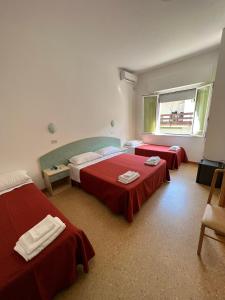 Postel nebo postele na pokoji v ubytování Hotel Chery