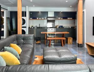 a living room with a couch and a table at Petaluma Warehouse Lofts unit E in Petaluma