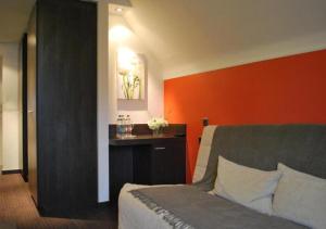 Kuchyň nebo kuchyňský kout v ubytování Hotel Rubens