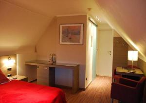 Postel nebo postele na pokoji v ubytování Hotel Rubens