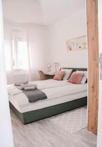 Krevet ili kreveti u jedinici u okviru objekta White apartment
