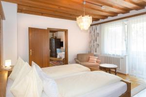 Posteľ alebo postele v izbe v ubytovaní Landhaus Tritscher