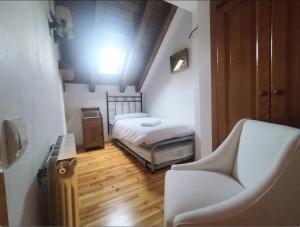 Postel nebo postele na pokoji v ubytování CHECK-IN CASAS Casa Puntarron + 4 fotografie