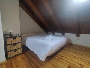 Postel nebo postele na pokoji v ubytování CHECK-IN CASAS Casa Puntarron