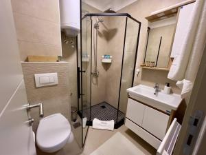 Kúpeľňa v ubytovaní Regulus apartment Brzeće Kopaonik + 37 fotografií
