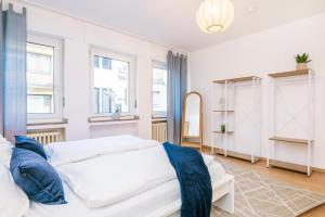 Ένα ή περισσότερα κρεβάτια σε δωμάτιο στο Center Terrace Dream Apartment